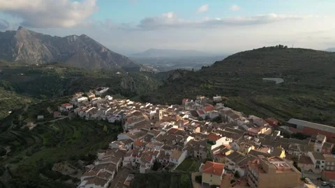 Aerial view Mountain landscape in old town Tarbena, Flight towards Valley Stock Footage 252534668