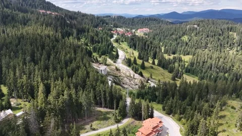 Aerial view of mountain landslide disaster near road and resort in Pamporovo Stock Footage 340773071