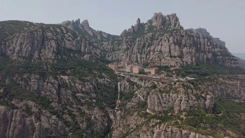 Aerial view of a mountain monastery built into cliffs Stockbeeldmateriaal 343325272