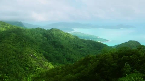 Aerial view mountain ocean and sky scene for traveling background and family Stock Footage 336579651