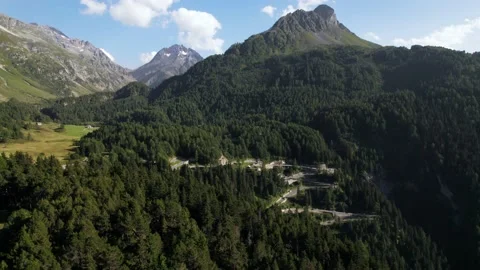Aerial view of mountain pass road | Maloja Stock Footage 237333064