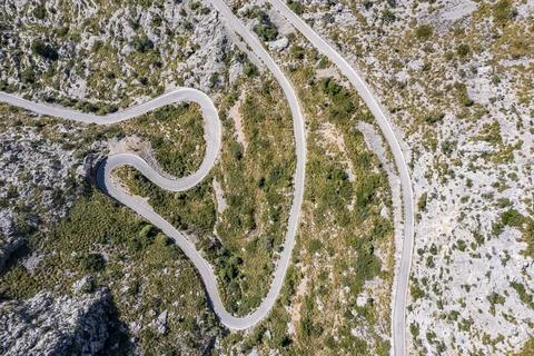 Aerial view mountain pass with switchbacks to Sa Colobra Serra de Tramuntana Stock Photos