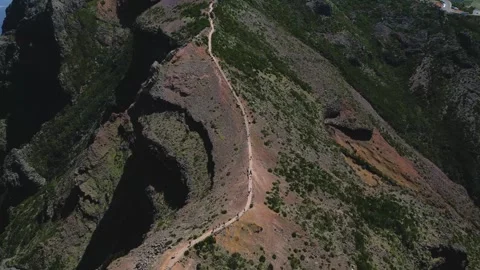 Aerial view of a mountain path leading to a radar station on a sunny day. Stock Footage 324506123
