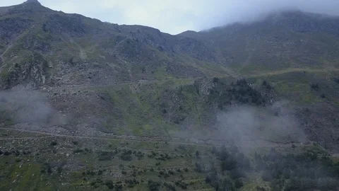 Aerial view of mountain paths in a cloudy day Stock Footage 102512502