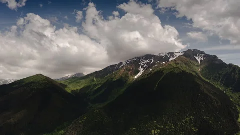 Aerial view of mountain peak. Time lapse beautiful movement of clouds. Stock Footage 283217550