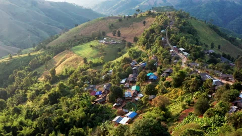 Aerial view of mountain range and tribal village in northern Thailand Stock Footage 146486111