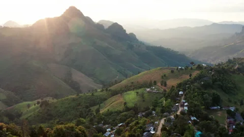Aerial view of mountain range and tribal village in northern Thailand Stock Footage 146486360