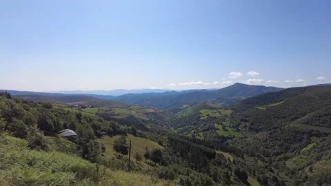 Aerial view mountain range and blue sky with clouds in Os Ancares Stock Footage 158957958