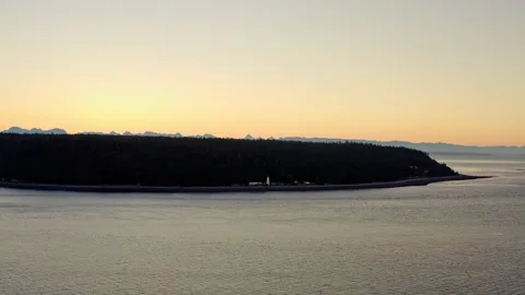 Aerial view of mountain range and forest island on the pacific coast, sunrise 库存影片 209343889