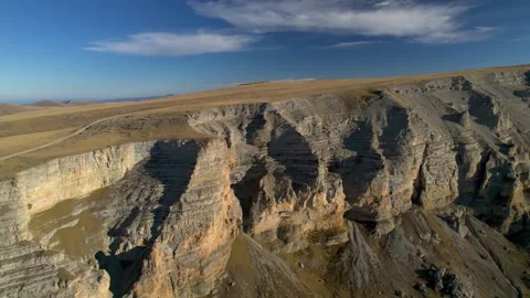 Aerial view of the mountain range and high cliffs. Stock Footage 240952334