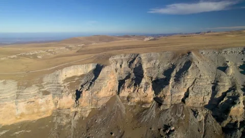 Aerial view of the mountain range and high cliffs. Stock Footage 240952374