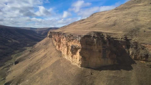 Aerial view of the mountain range and high cliffs. Stock Footage 241002688