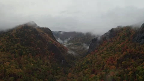 Aerial View of a Mountain Range in Clouds 動画素材 266923269
