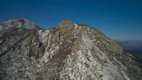 Aerial view of a mountain range with high cliffs. Stock Footage 304972065
