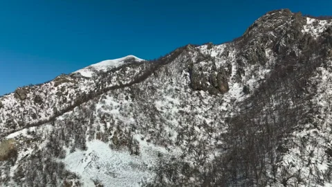 Aerial view of a mountain range with high cliffs. Stock Footage 304972447