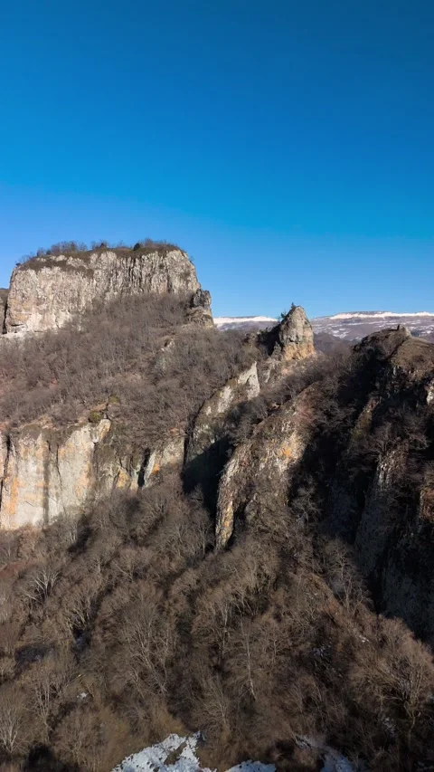 Aerial view of a mountain range with high cliffs. Stock Footage 304973490