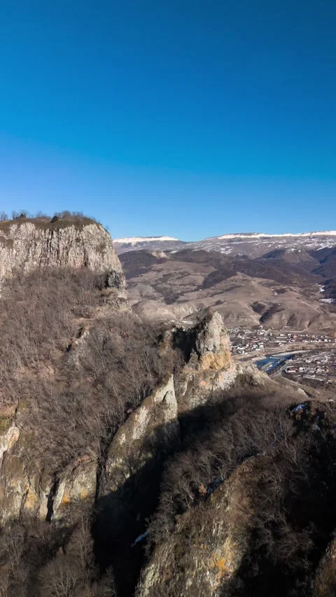 Aerial view of a mountain range with high cliffs. Stock Footage 304973550