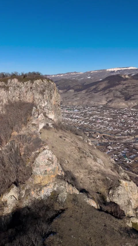 Aerial view of a mountain range with high cliffs. Stock Footage 304973631