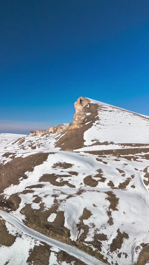 Aerial view of a mountain range with high cliffs. Stock Footage 304973675