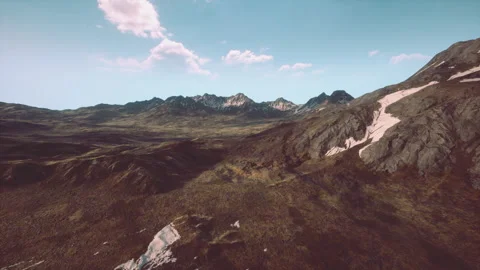 An aerial view of a mountain range with a sky background Stock Footage 316629696