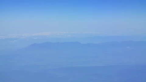 Aerial view of mountain range with slow camera pan in 4k slow motion 60fps Stockbeeldmateriaal 284218033
