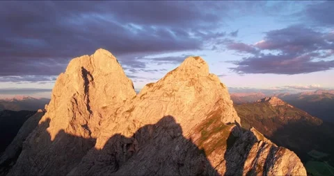 Aerial View of Mountain Range at Sunset in the Alps Stock Footage 236499438