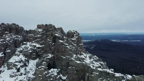 Aerial view of mountain range in winter day, drone moves forward Stock Footage 120820622