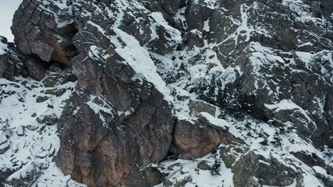 Aerial view of mountain range in winter day, drone moves sideways Stock Footage 120820959