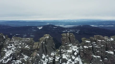 Aerial view of mountain range in winter day, drone moves forward Stock Footage 120821235