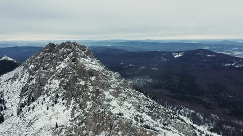 Aerial view of mountain range in winter day, drone moves sideways Stock Footage 120822938