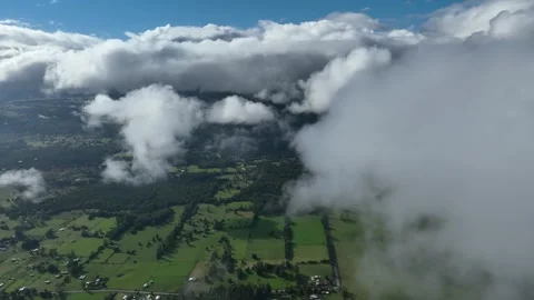 Aerial view Mountain Reflections on Calm Water Under a Cloudy Sky Stock Footage 312750573