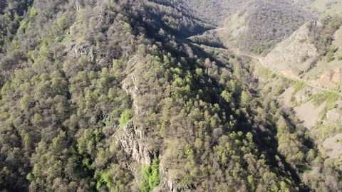 Aerial view of mountain ridge and scenic highway road to Jily-Su in gorge Stock Footage 337023761