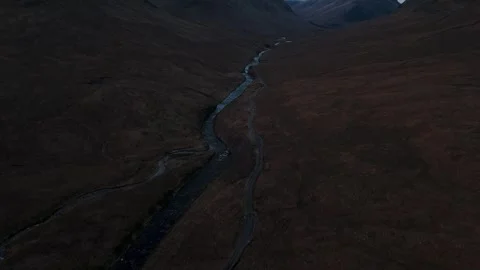 Aerial View of Mountain River and a bridge in Scottish Highlands Stock Footage 331167643