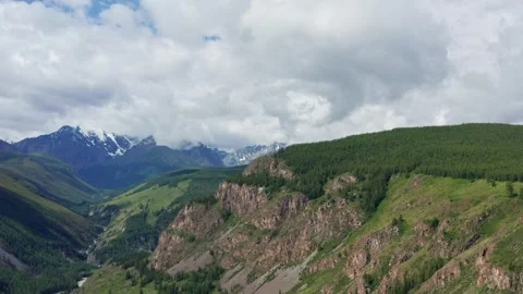 Aerial view of the mountain river between the mountains Stock Footage 317743127