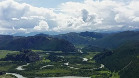Aerial view of the mountain river between the mountains Stock Footage 317743238