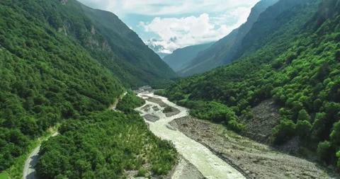 Aerial view of a mountain river flowing through a mountain gorge. 스톡 동영상 157731735