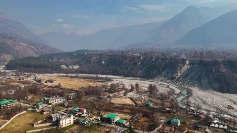 Aerial View of Mountain River Flowing Through Dry Winter Landscape Stock Footage 340966895