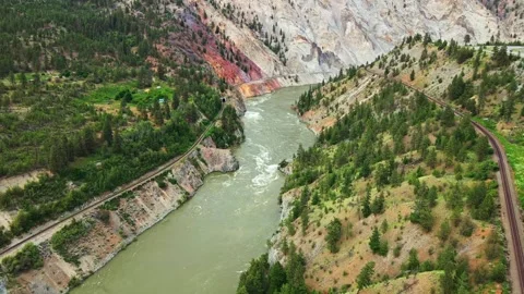 Aerial view of a mountain river flowing through a scenic canyon Stock-Footage 343543365