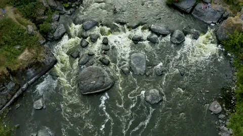Aerial view on mountain river with rapids rocks and rocks in the forest 스톡 동영상 165345121