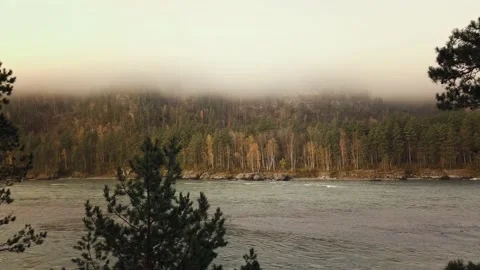 Aerial view of mountain river, valleys and forest through clouds in the morning Stock-Footage 144201254