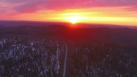 AERIAL: View of the mountain road , during colorful sunset. Stock Footage 82028764