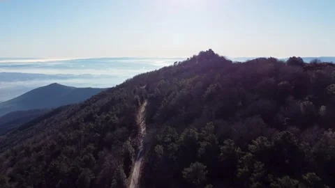Aerial view of mountain road; Vidéo 144921685