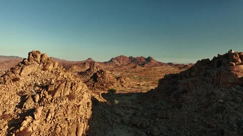 Aerial view of the mountain rock formations in Namibia, Africa. Stock Footage 299845575