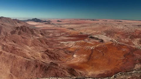 Aerial view of the mountain rock formations in Namibia, Africa. Stock Footage 299924236
