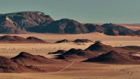 Aerial view of the mountain rock formations in Namibia, Africa. Stock Footage 299926034