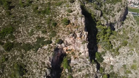 Aerial view of a mountain slope with cliffs Stock Footage 241516149