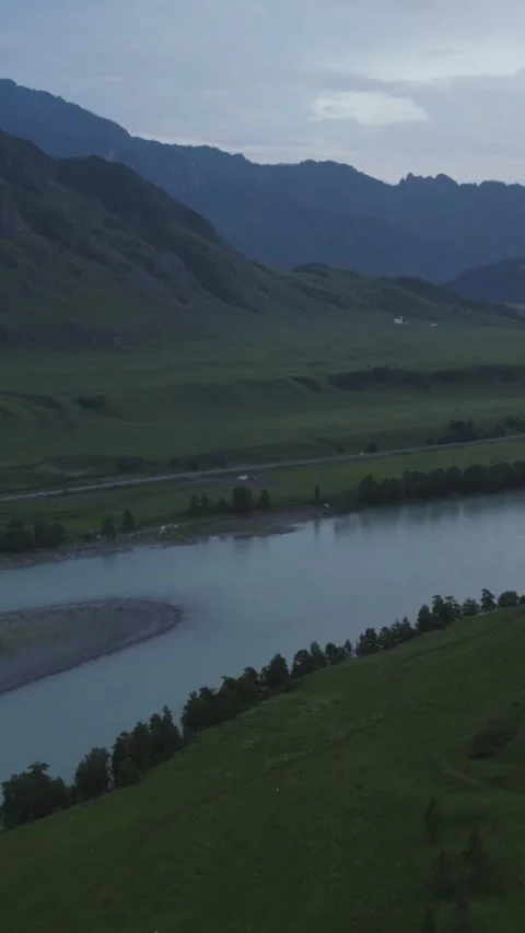 Aerial view of Mountain Spirits Gorge valley and river in Altai at dusk Stock Footage 335660596