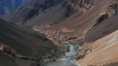 Aerial View of Mountain Stream in Dry Tibetan Canyon Stock Footage 311046065