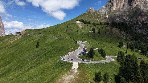 Aerial View of Mountain Switchback Road with Traffic, Dolomites Stock Footage 339876041