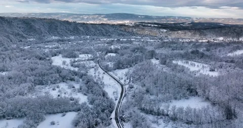 Aerial view of mountain twisted road in the winter. Empty road Stock Footage 201492286